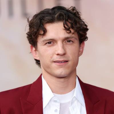 Tom D Holland